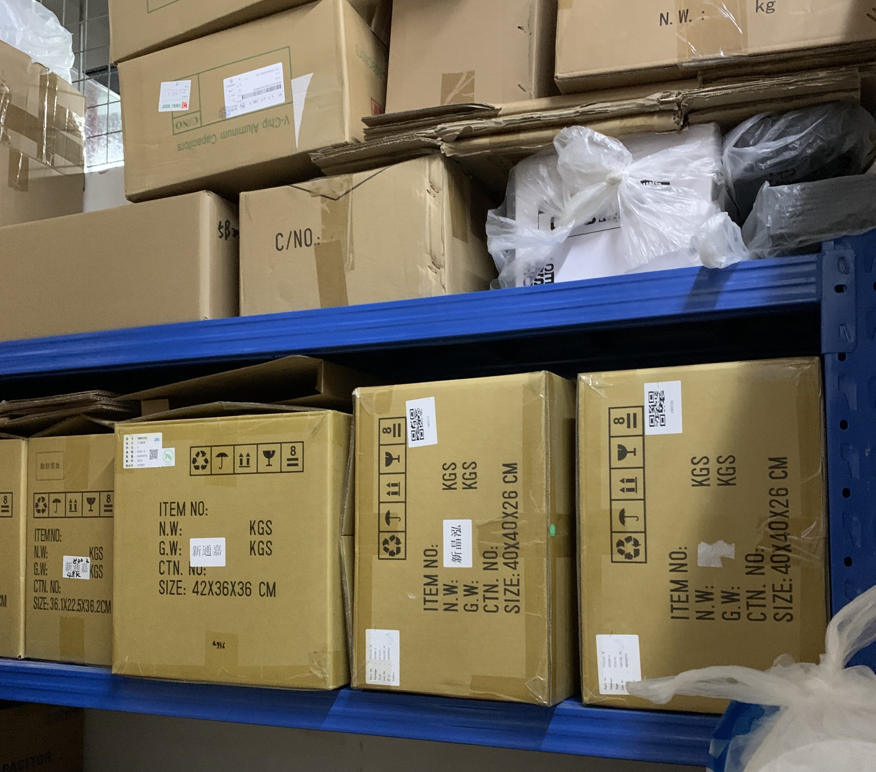 Electronic components warehouse with organized storage shelves